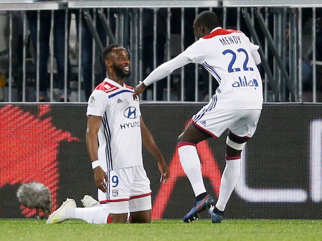 Dembele rescues late Lyon win over 10-man Bordeaux
