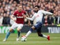 Mark Noble and Danny Rose in action during the Premier League game between Tottenham Hotspur and West Ham United on April 27, 2019