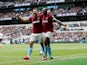 Michail Antonio celebrates with Robert Snodgrass after making the breakthrough during the Premier League game between Tottenham Hotspur and West Ham United on April 27, 2019