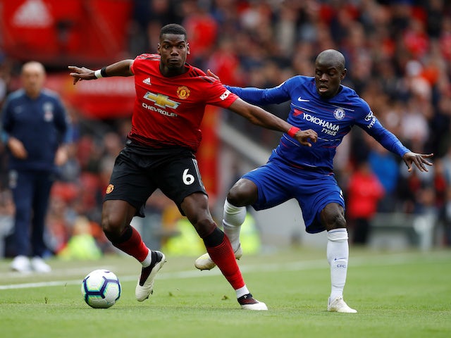 Paul Pogba and N'Golo Kante in action during the Premier League game between Manchester United and Chelsea on April 28, 2019