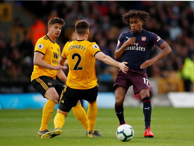 Wolverhampton Wanderers and Arsenal battle for the ball in their Premier League fixture on April 24, 2019.