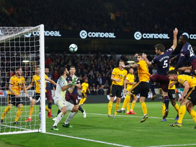 Sokratis Papastathopoulos scores for Arsenal against Wolverhampton Wanderers in the Premier League on April 24, 2019.