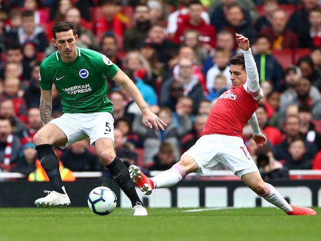 Lewis Dunk and Lucas Torreira in action during the Premier League game between Arsenal and Brighton & Hove Albion on May 5, 2019