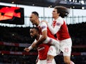 Alexandre Lacazette is pounced on by his teammates after equalising for Arsenal against Valencia in their Europa League semi-final on May 2, 2019