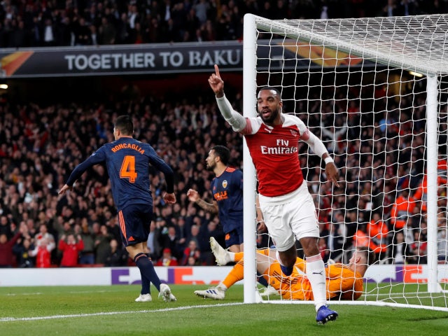 Alexandre Lacazette celebrates after scoring his second of the game in Arsenal's Europa League semi-final first leg against Valencia on May 2, 2019