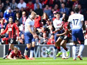 Bournemouth strike late to beat nine-man Spurs