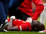 Manchester United's Eric Bailly suffers a knee injury against Chelsea in the Premier League on April 28, 2019.