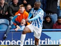 Isaac Mbenza celebrates scoring during the Premier League game between Huddersfield Town and Manchester United on May 5, 2019