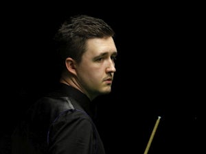Kyren Wilson pleased to advance after "really strange day of snooker"