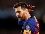 Barcelona captain Lionel Messi briefly pops his head out of Joel Matip's pocket during the Champions League clash with Liverpool on May 1, 2019