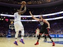 Philadelphia 76ers center Joel Embiid (21) shoots a jump shot past Toronto Raptors center Marc Gasol (33) in game three of the second round of the 2019 NBA Playoffs at Wells Fargo Center