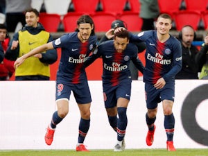 Paris St Germain's Neymar celebrates scoring their first goal with Edinson Cavani and Marco Verratti on May 4, 2019