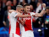 Ajax's Hakim Ziyech celebrates scoring his side's second goal against Tottenham Hotspur with Dusan Tadic on May 8, 2019