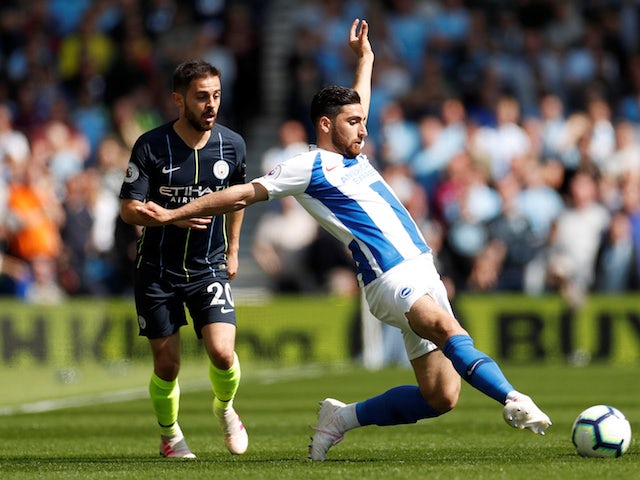 Manchester City's Bernardo Silva in action with Brighton & Hove Albion's Alireza Jahanbakhsh in the Premier League on May 12, 2019