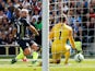 Manchester City's Sergio Aguero scores against Brighton & Hove Albion in the Premier League on May 12, 2019