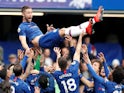 Chelsea captain Gary Cahill is lifted by teammates after his final home appearance for the club on May 5, 2019