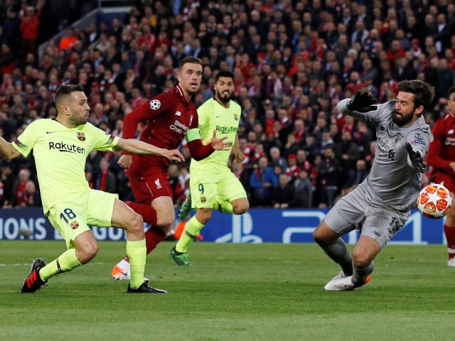 Liverpool's Alisson saves from Barcelona's Jordi Alba in the Champions League on May 7, 2019.