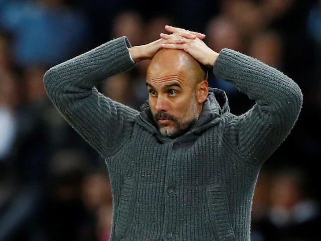 Pep Guardiola on the edge of his proverbial seat during the Premier League game between Manchester City and Leicester City on May 6, 2019