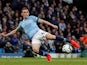 Phil Foden takes a shot during the Premier League game between Manchester City and Leicester City on May 6, 2019