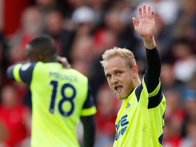 Huddersfield Town's Alex Pritchard celebrates scoring their first goal against Southampton on May 12, 2019