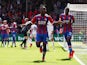 Crystal Palace's Michy Batshuayi celebrates scoring their second goal with Aaron Wan-Bissaka on May 12, 2019