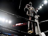 Deontay Wilder (bronze trunks) celebrates moments after defeating Dominic Breazeale by knockout in the first round of their world heavyweight championship boxing match at Barclays Center on May 19, 2019