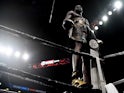 Deontay Wilder (bronze trunks) celebrates moments after defeating Dominic Breazeale by knockout in the first round of their world heavyweight championship boxing match at Barclays Center on May 19, 2019