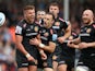 Exeter Chiefs' Henry Slade celebrates scoring their first try with team mates on May 18, 2019