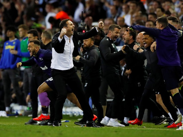 Derby County manager Frank Lampard celebrates his side's victory over Leeds United on May 15, 2019