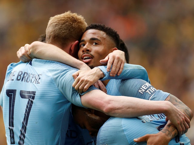 Manchester City's Gabriel Jesus celebrates scoring their fourth goal with Raheem Sterling and Kevin De Bruyne on May 18, 2019