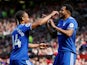 Cardiff City's Nathaniel Mendez-Laing celebrates scoring their first goal from the penalty spot with Bobby Reid on May 12, 2019
