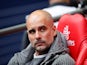 Manchester City manager Pep Guardiola watches on before the FA Cup final against Watford on May 18, 2019
