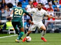 Real Madrid's Dani Carvajal in action with Real Betis's Junior Firpo in La Liga on May 19, 2019