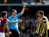 Watford's Jose Holebas is shown a red card by referee Chris Kavanagh on May 12, 2019