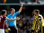 Watford's Jose Holebas is shown a red card by referee Chris Kavanagh on May 12, 2019