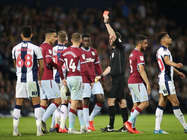Chris Brunt is shown a red card in the second leg of the Championship playoff semi-final between West Bromwich Albion and Aston Villa on May 14, 2019
