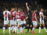Chris Brunt is shown a red card in the second leg of the Championship playoff semi-final between West Bromwich Albion and Aston Villa on May 14, 2019