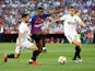 Barcelona's Nelson Semedo battles Valencia's Jose Gaya for the ball during the Copa del Rey final on May 25, 2019