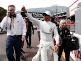 Lewis Hamilton celebrates qualifying in pole position for the Monaco Grand Prix in May 25, 2019