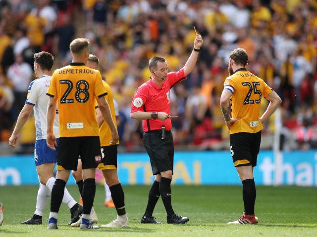 Newport County's Mark O'Brien is shown a red card in the League Two playoff final against Tranmere Rovers on May 25, 2019