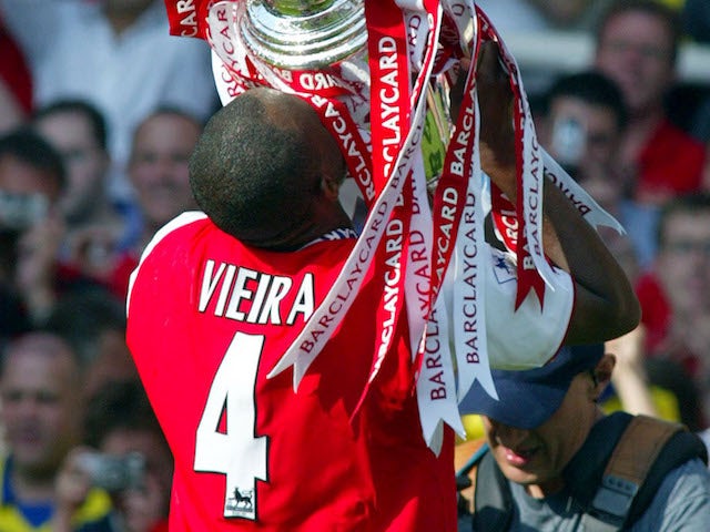Patrick Vieira lifts the Premier League trophy in 2004