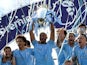 Manchester City captain Vincent Kompany lifts the 2018-19 Premier League trophy