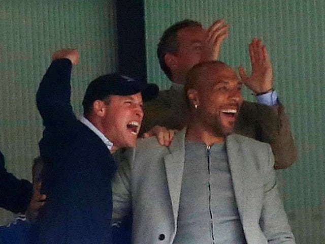 Prince William celebrates Aston Villa promotion with John Carew