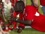 Djimi Traore kisses the Champions League trophy in 2005