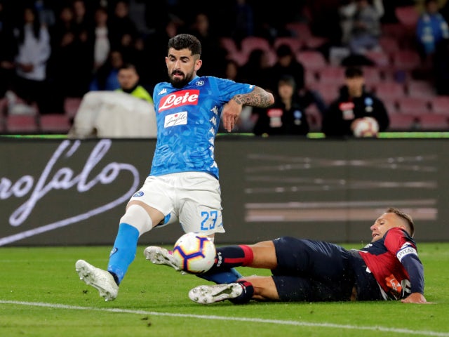 Napoli's Elseid Hysaj in Serie A action with Genoa's Domenico Criscito on April 7, 2019