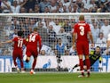 Liverpool forward Mohamed Salah converts a penalty against Tottenham Hotspur in the 2019 Champions League final on June 1, 2019