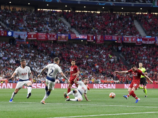 Andy Robertson has a shot kept out by Hugo Lloris during Liverpool's Champions League final showdown with Tottenham Hotspur on June 1, 2019