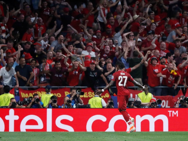 Divock Origi celebrates after scoring Liverpool's second goal in the Champions League final win over Tottenham Hotspur on June 1, 2019