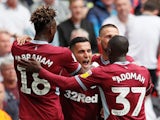 Anwar El Ghazi celebrates with his Aston Villa teammates after opening the scoring against Derby County in the Championship playoff final on May 27, 2019