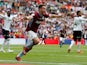 John McGinn celebrates after scoring Aston Villa's second goal against Derby County in the Championship playoff final on May 27, 2019